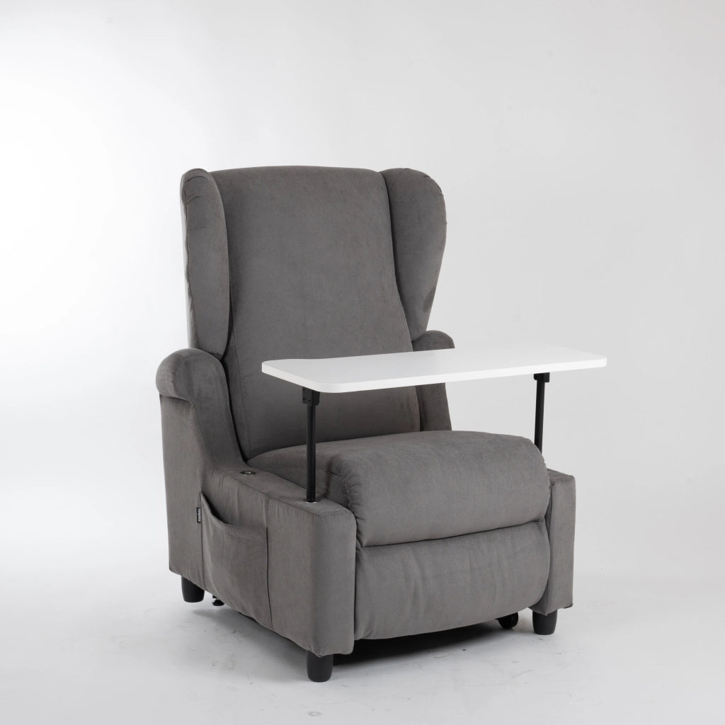 Lift-Relaxsessel Chanel von egoista in Grau mit hoher Rückenlehne, gepolsterten Armlehnen und einem weißen, abnehmbaren Tisch – ideal als komfortabler Pflegesessel für Senioren oder Personen mit eingeschränkter Mobilität