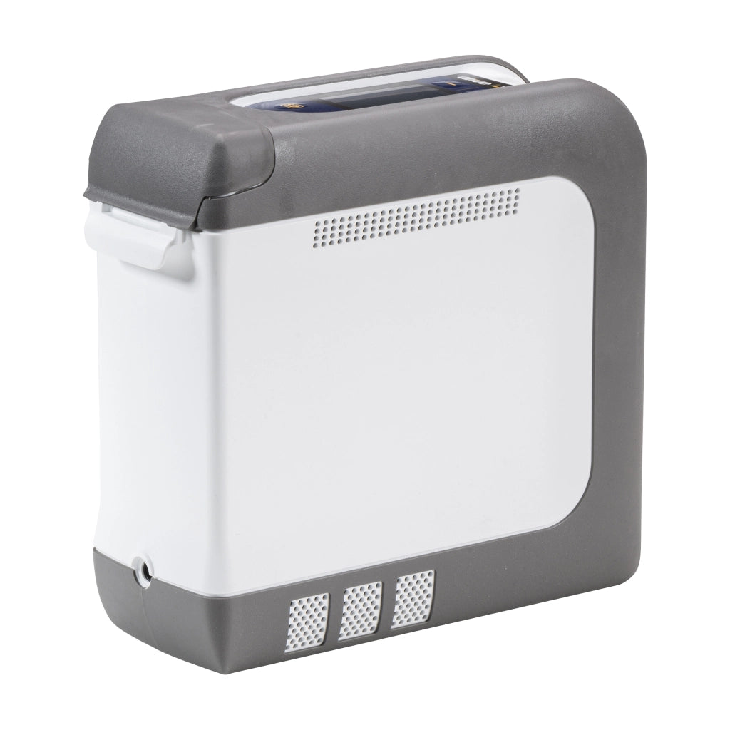 Tragbarer Sauerstoffkonzentrator iGo2 von Drive Medical in Seitenansicht, kompakt und leicht im Design mit grauen Schutzkanten und Luftauslässen – ideal für den mobilen Einsatz.