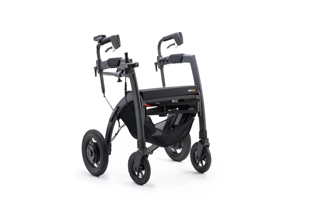 Rollz Motion Electric in der Rollator-Konfiguration, in stilvollem Schwarz. Der faltbare 3-in-1-Mobilitätshelfer kombiniert die Funktionen eines Rollators, Transportrollstuhls und Elektrorollstuhls. Ergonomisches Design mit stabilen Rädern und höhenverstellbaren Griffen.