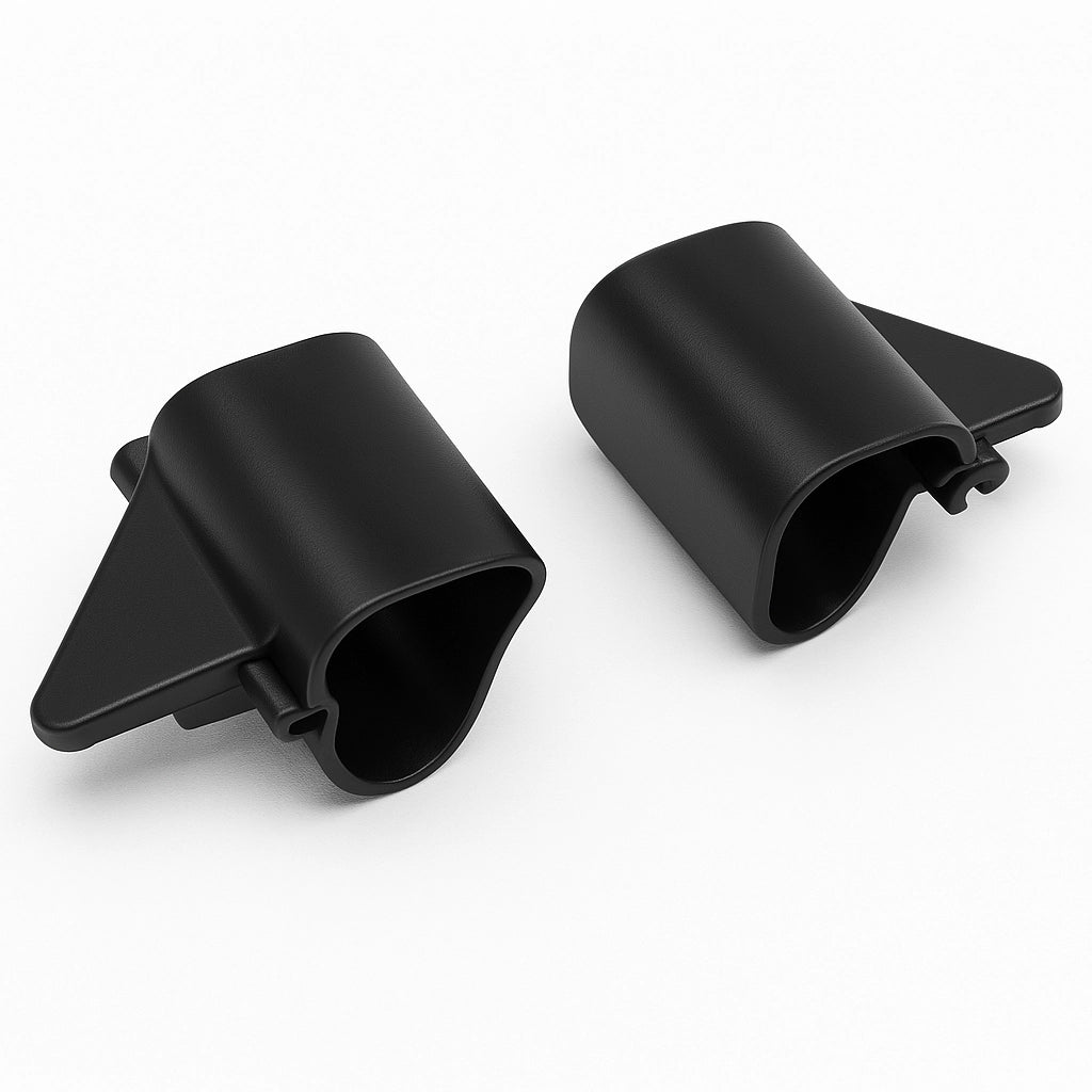 Zwei schwarze Bremsblöcke für den Rehasense Rollator Athlon SL, aus Kunststoff gefertigt, in schräger Perspektive vor weißem Hintergrund dargestellt